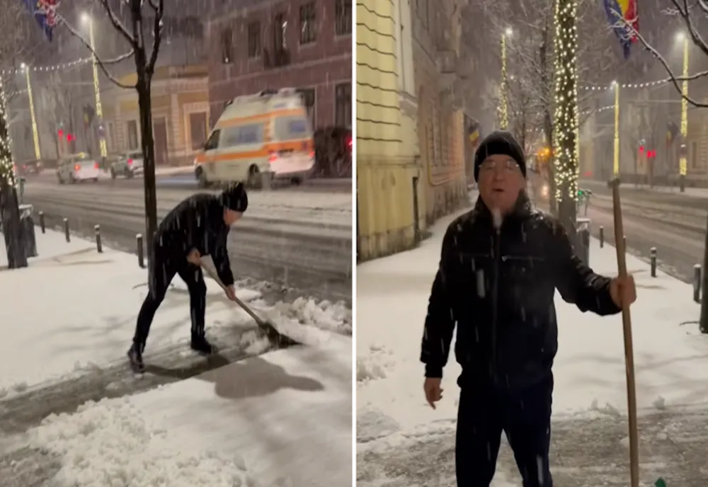 Emil Boc, show cu lopata în fața Primăriei Cluj-Napoca VIDEO